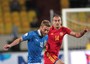 Daniele De Rossi (s) contrastato da Yura Movsisyan